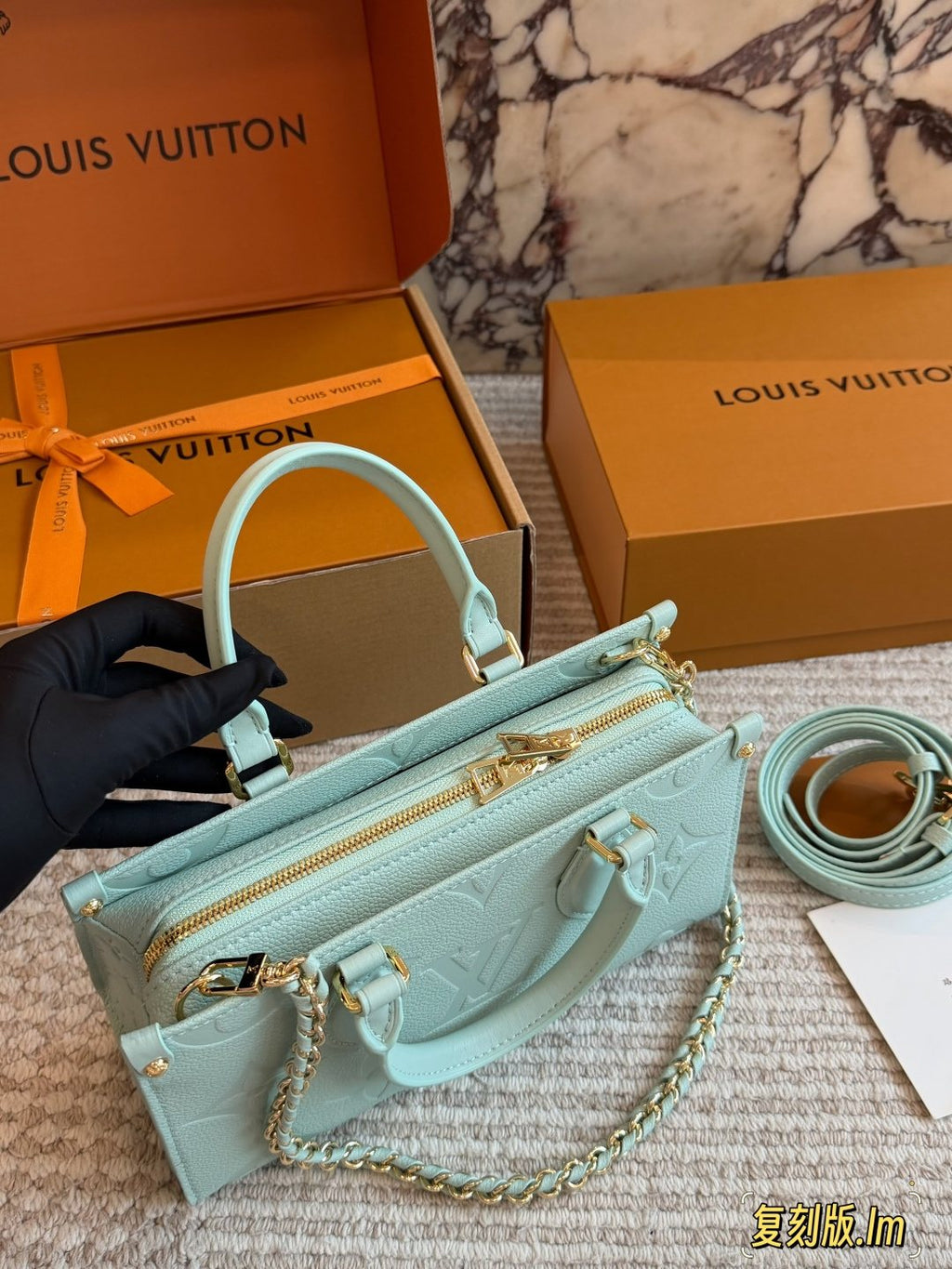 Louis Vuitton Onthego Mint Green Embossed Handbag — front