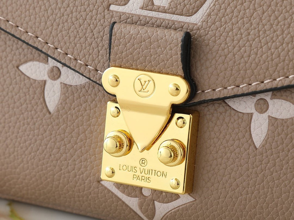 Louis Vuitton Pochette Métis East West Monogram Empreinte Bag — detail