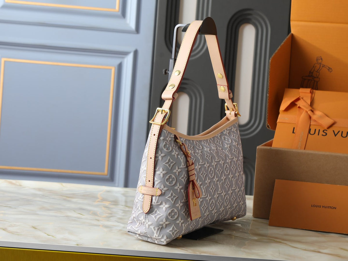 Louis Vuitton Carryall East-West Monogram Emblème Shoulder Bag — side