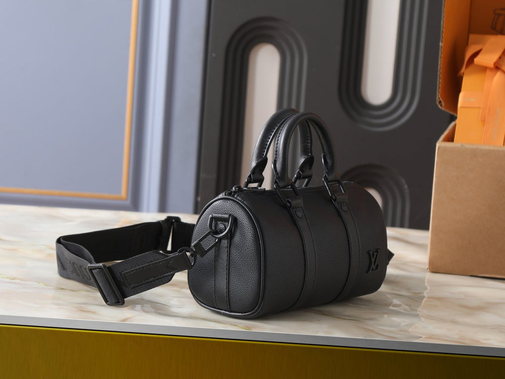 Louis Vuitton Keepall XS Black Barrel Bag — side