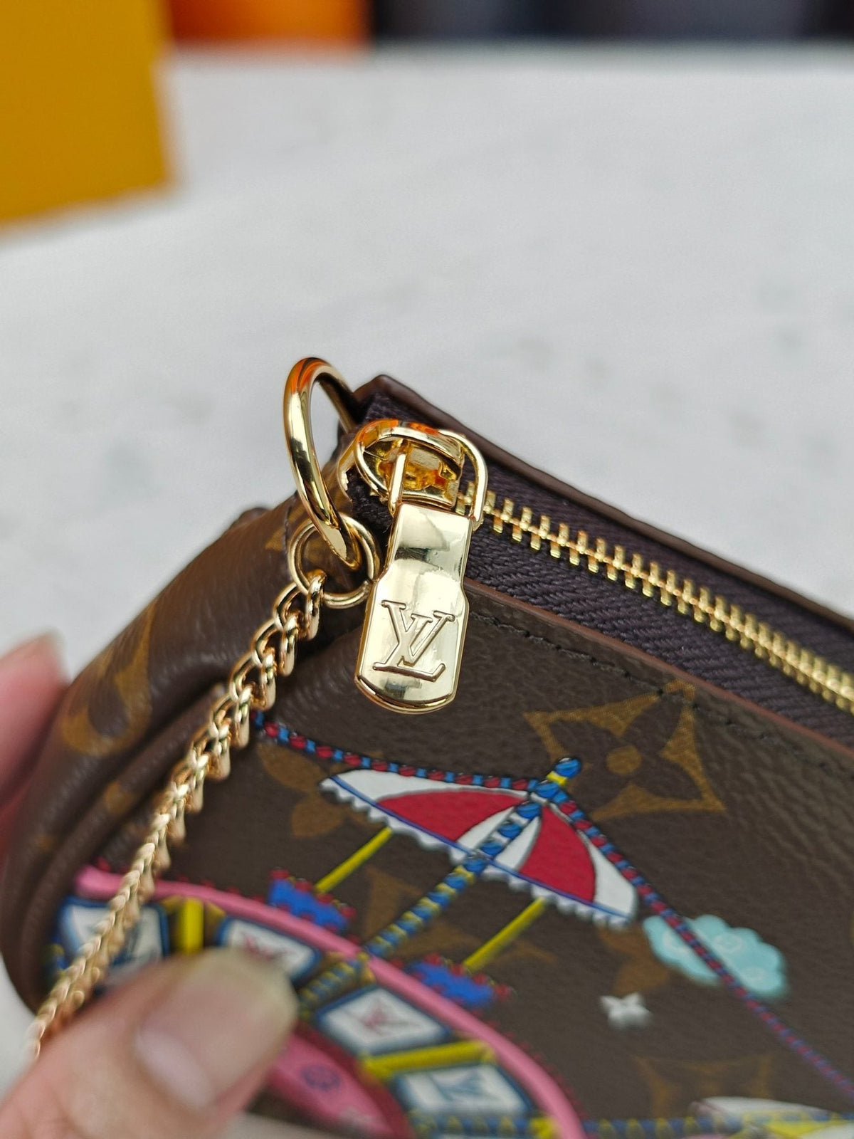 Louis Vuitton Illustrated Monogram Chain Pouch — detail