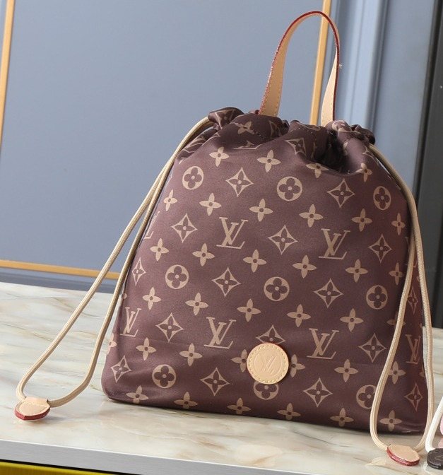 Louis Vuitton Drawstring Bag with Round Medallion — hero