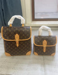 Louis Vuitton Monogram Buckle-Flap Top-Handle Bag — hero