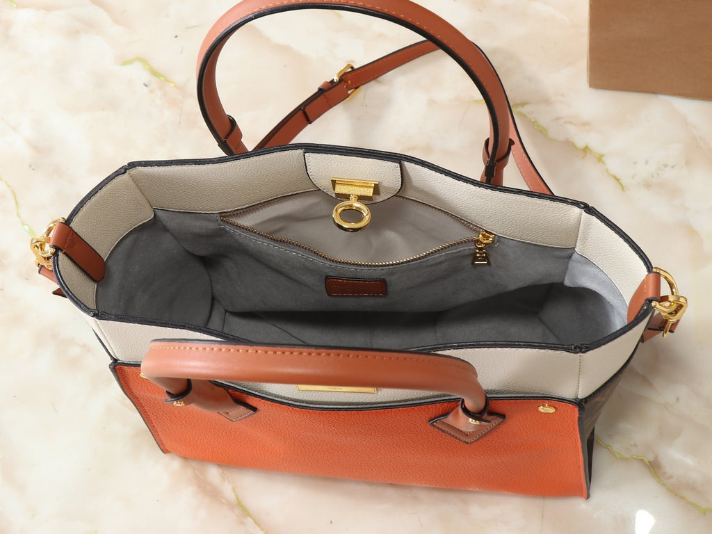 Louis Vuitton On My Side Turn-Lock Tote — detail