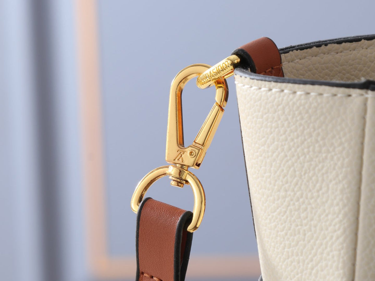 Louis Vuitton On My Side Turn-Lock Tote — detail
