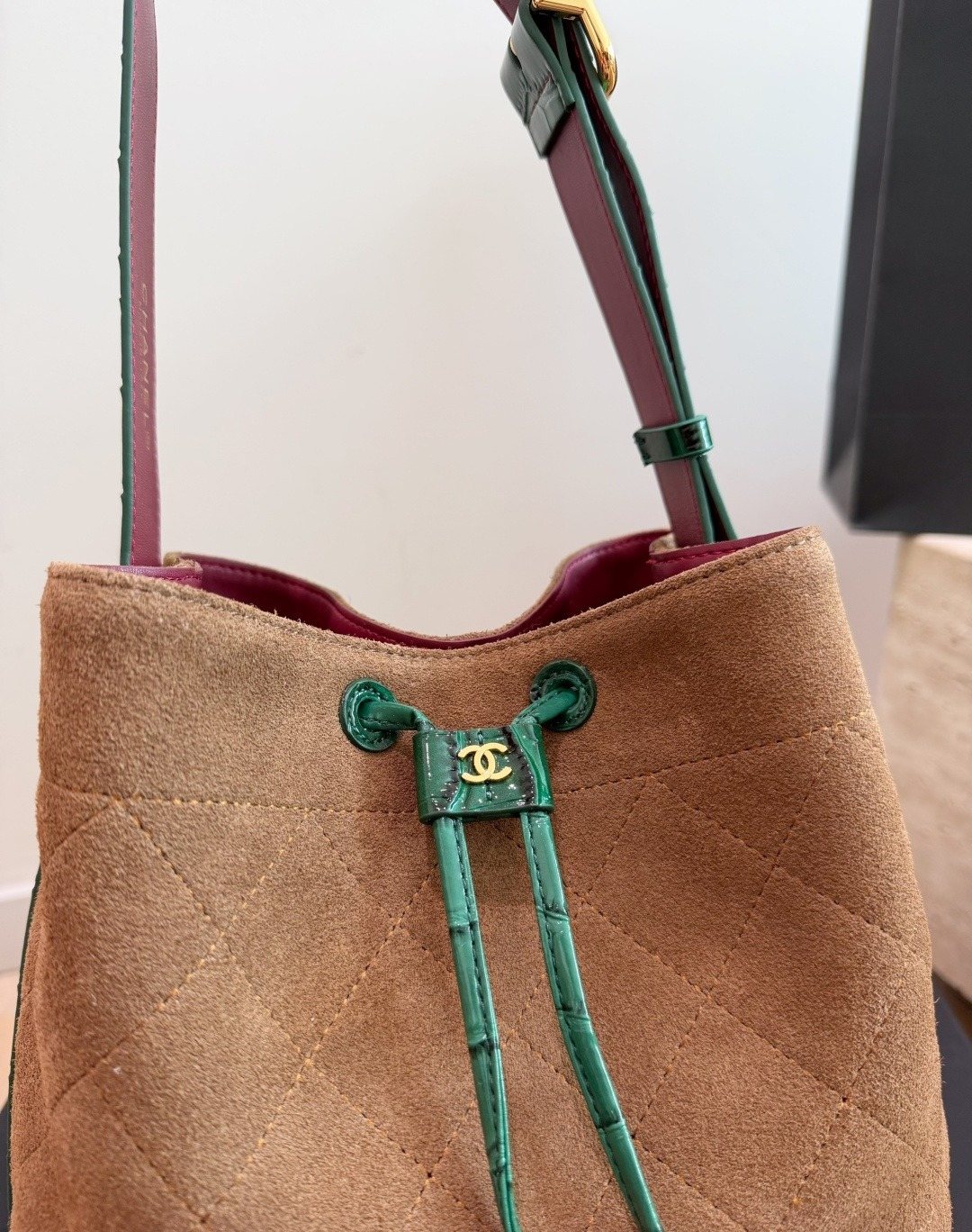 Chanel Contrast-Trim Drawstring Bucket Bag — detail