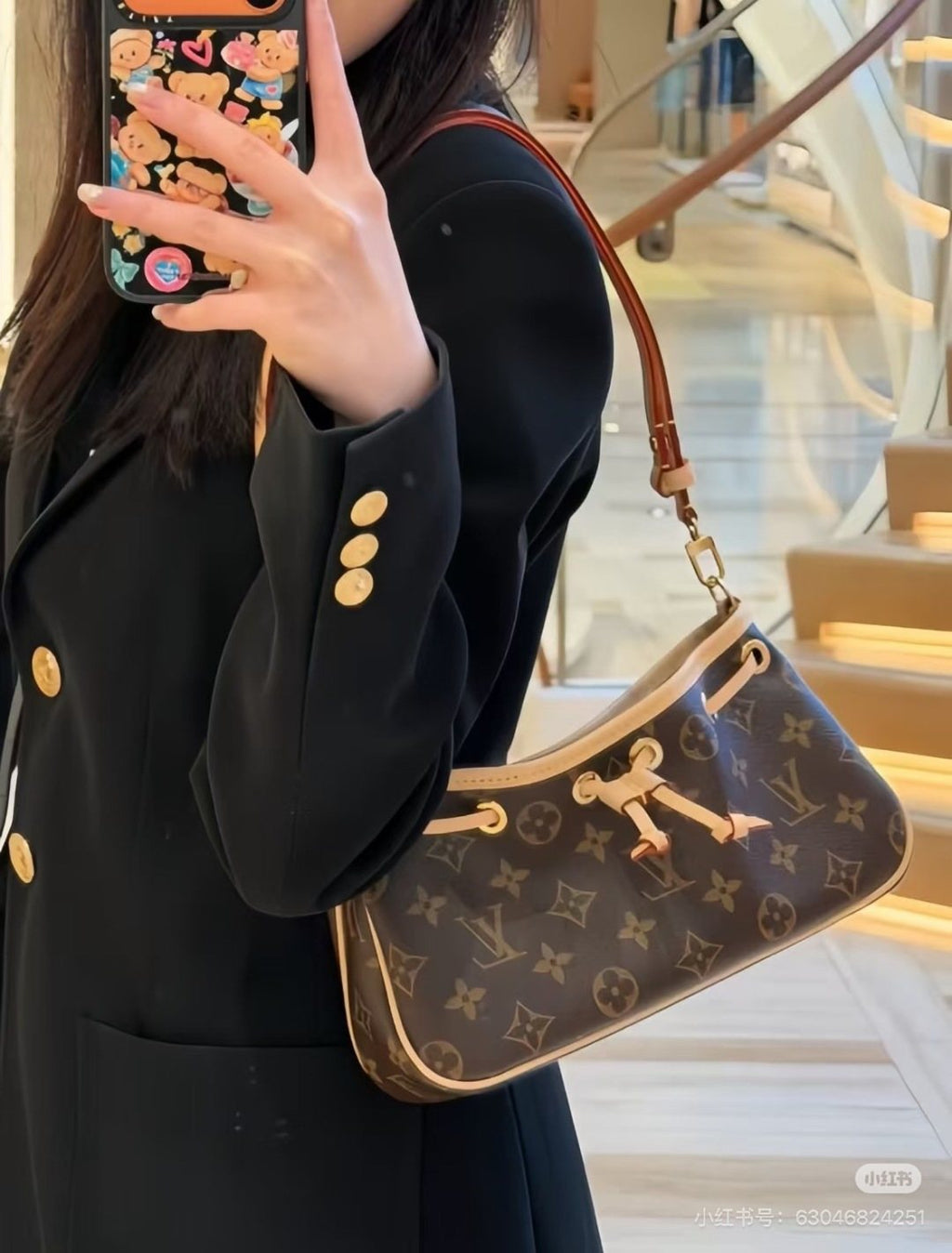 Louis Vuitton Nano Frivole Monogram Drawstring Shoulder Bag — model