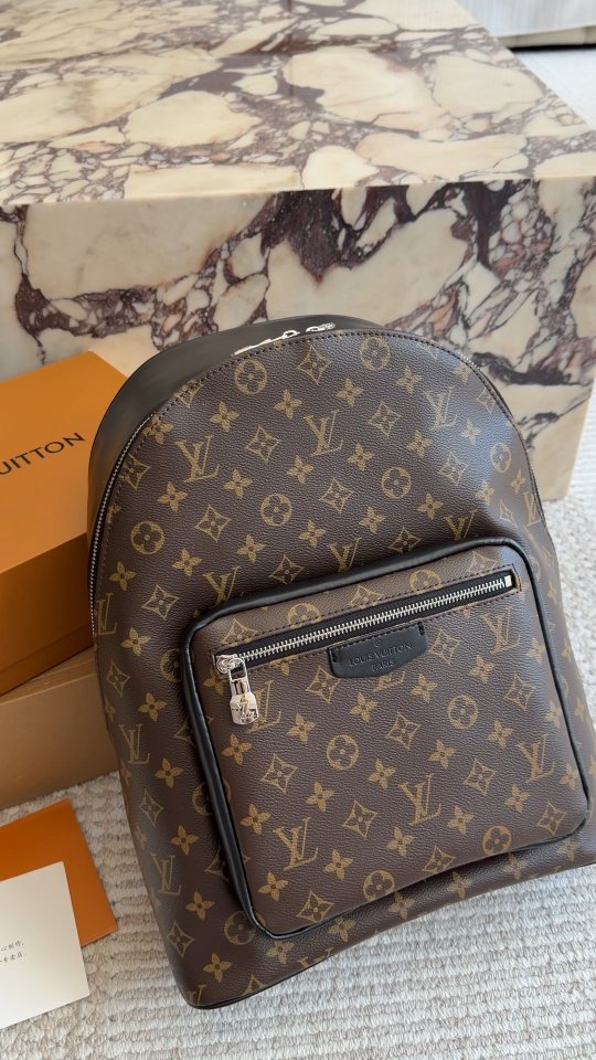 Louis Vuitton Black-Trim Zip Backpack — hero