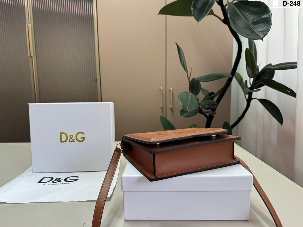 Dolce & Gabbana Raised DG Flap Crossbody Bag — detail