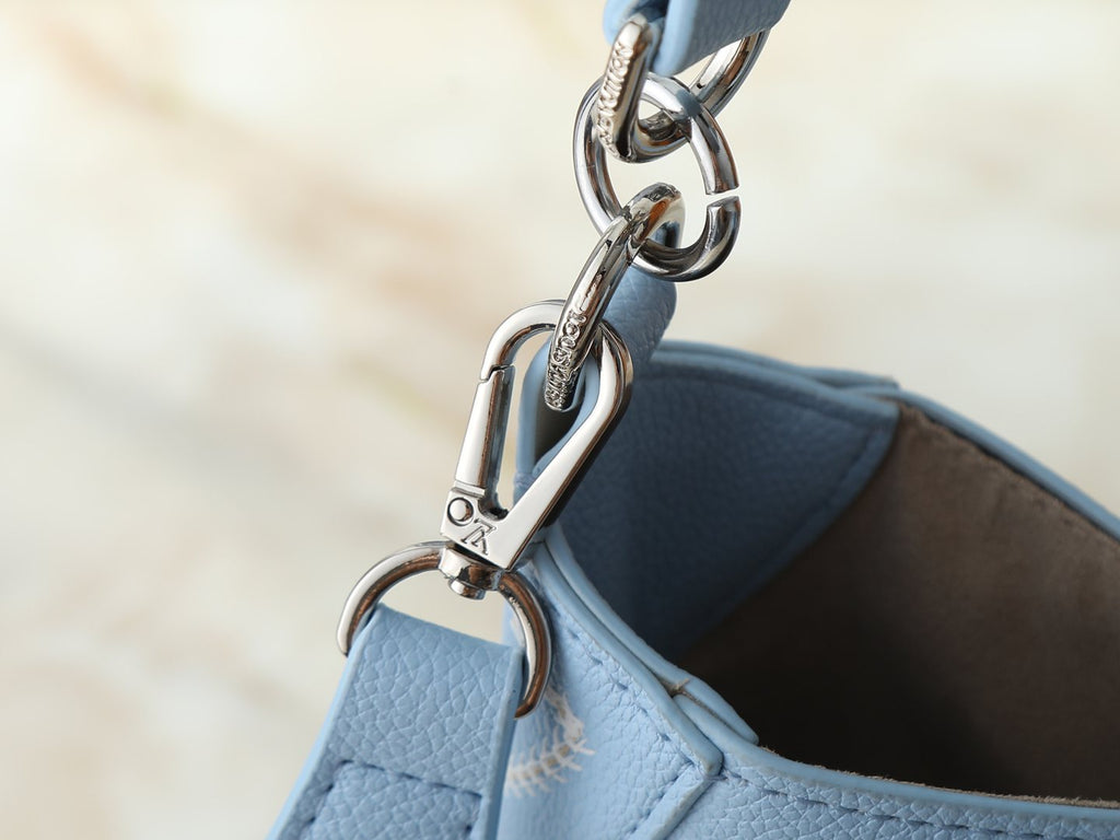 Louis Vuitton All Around Perforated Leather Shoulder Bag — detail
