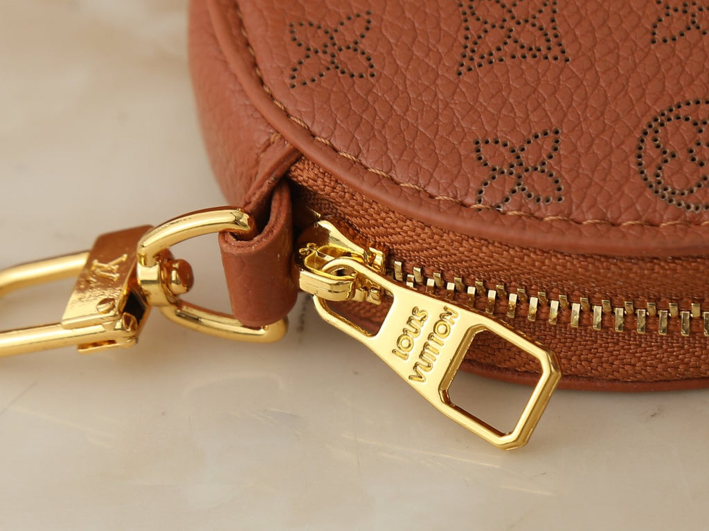 Louis Vuitton Bella Perforated Monogram Bucket Bag — detail