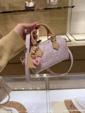 Louis Vuitton Speedy Embossed Monogram Top-Handle Bag — hero