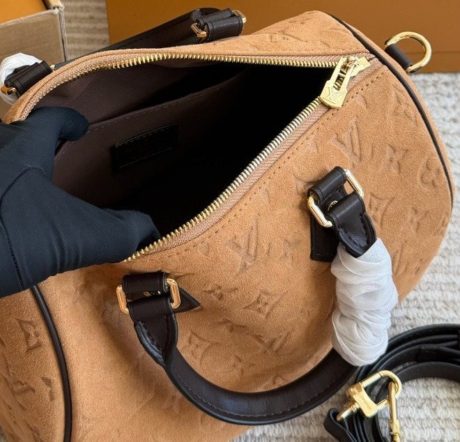 Louis Vuitton Speedy Camel Embossed Monogram Handbag — detail