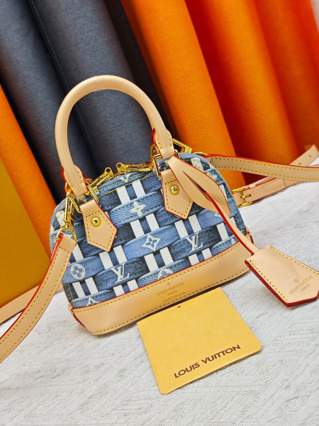 Louis Vuitton Alma BB Domed Top-Handle Bag — front