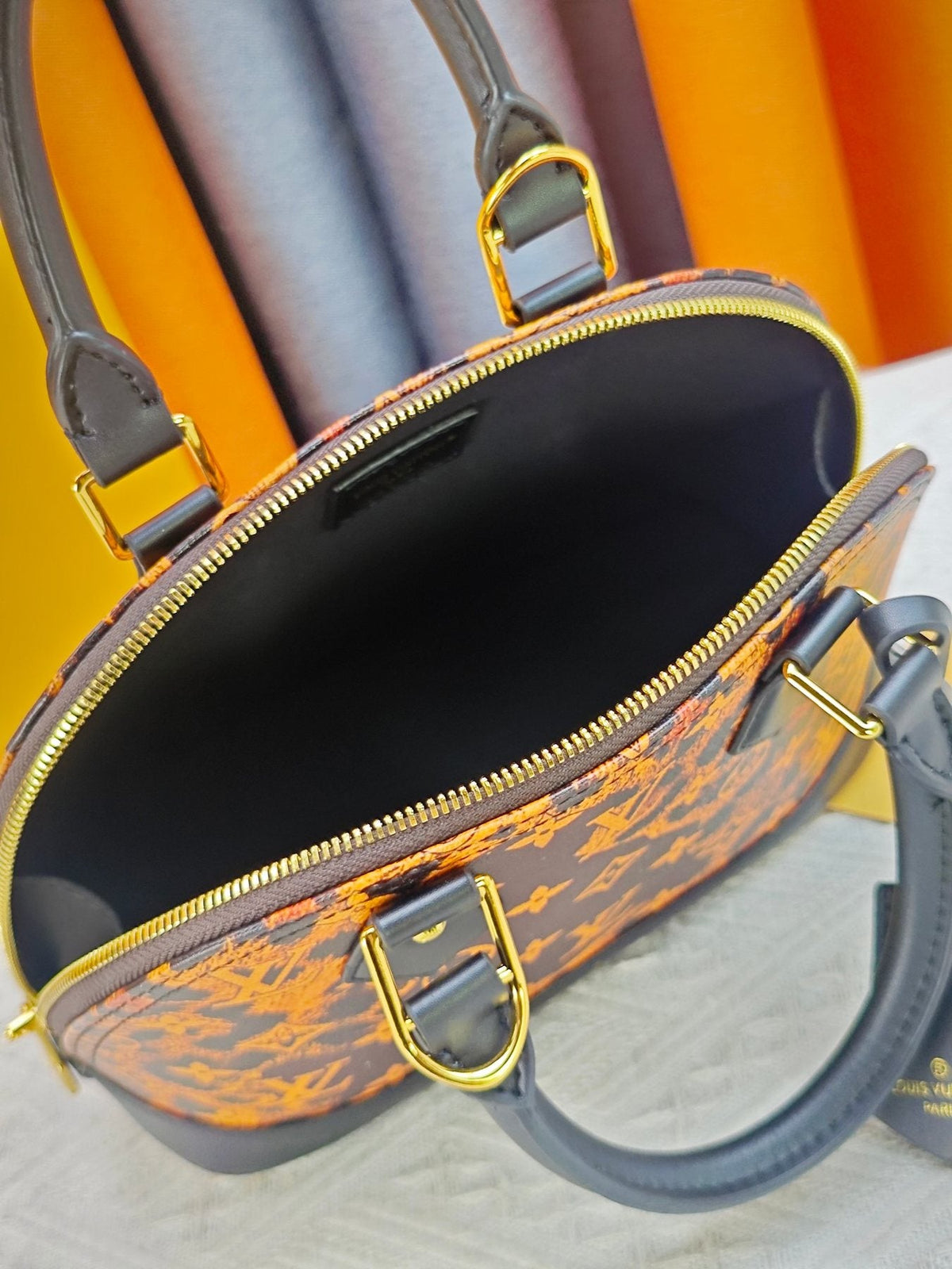Louis Vuitton Alma BB Domed Top-Handle Bag — detail