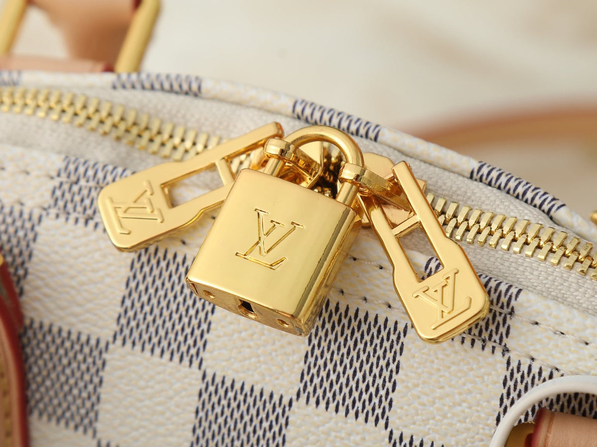 Louis Vuitton Alma Structured Top-Handle Bag — detail