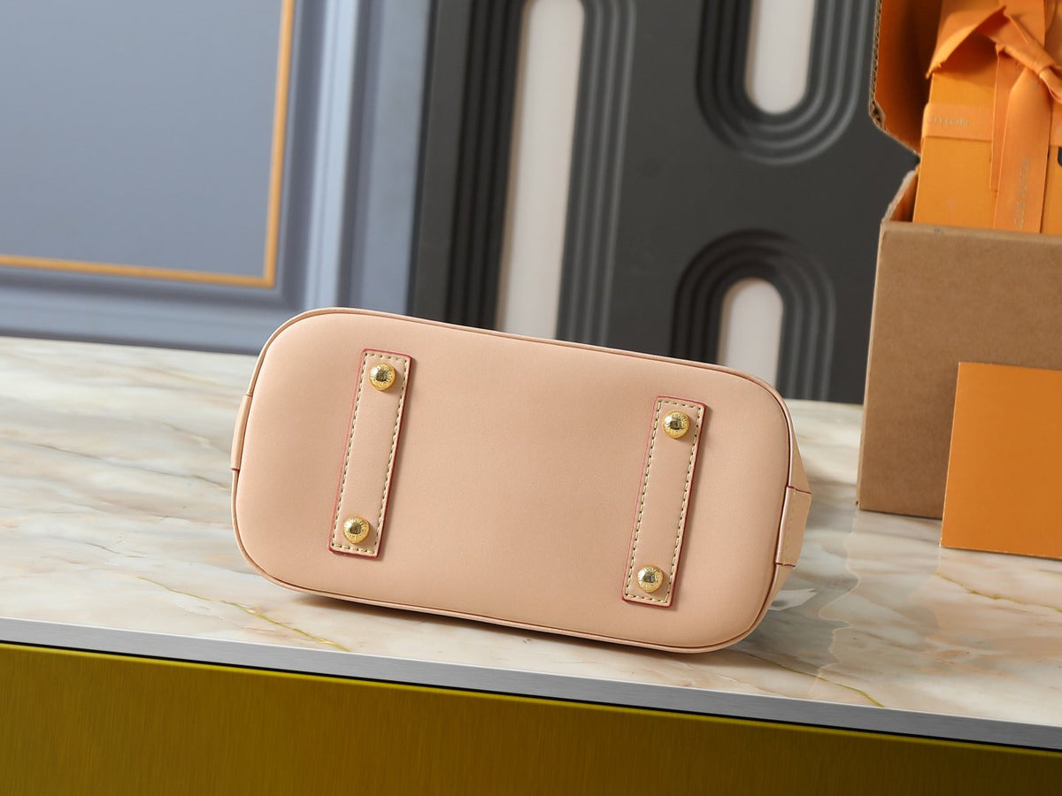 Louis Vuitton Alma Structured Top-Handle Bag — detail