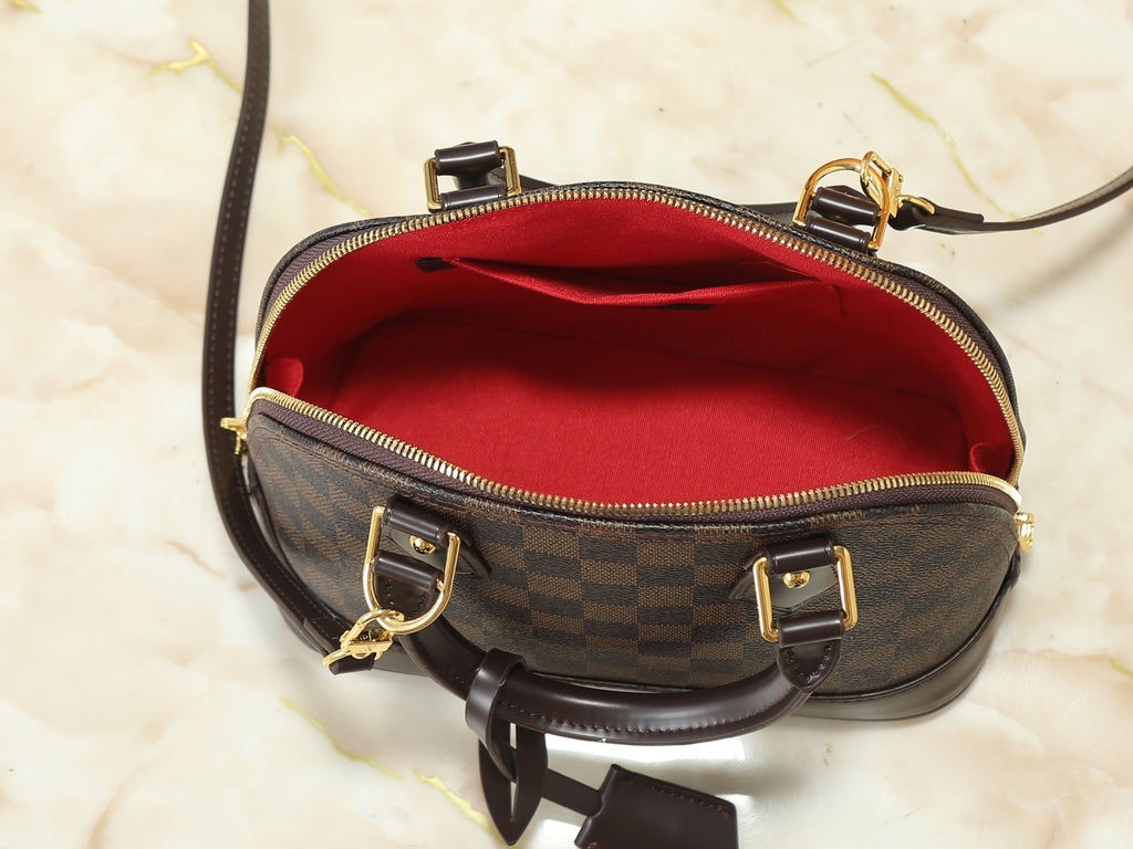 Louis Vuitton Alma Structured Top-Handle Bag — detail