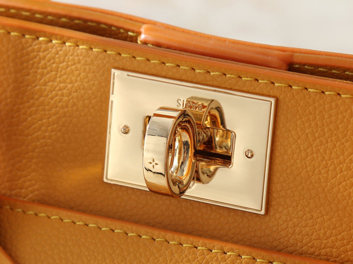 Louis Vuitton On My Side Turnlock Tote — detail