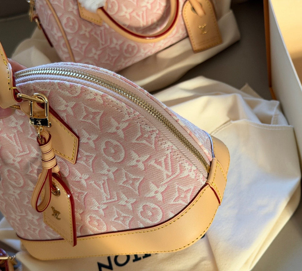 Louis Vuitton Alma BB Monogram Top-Handle Bag — side