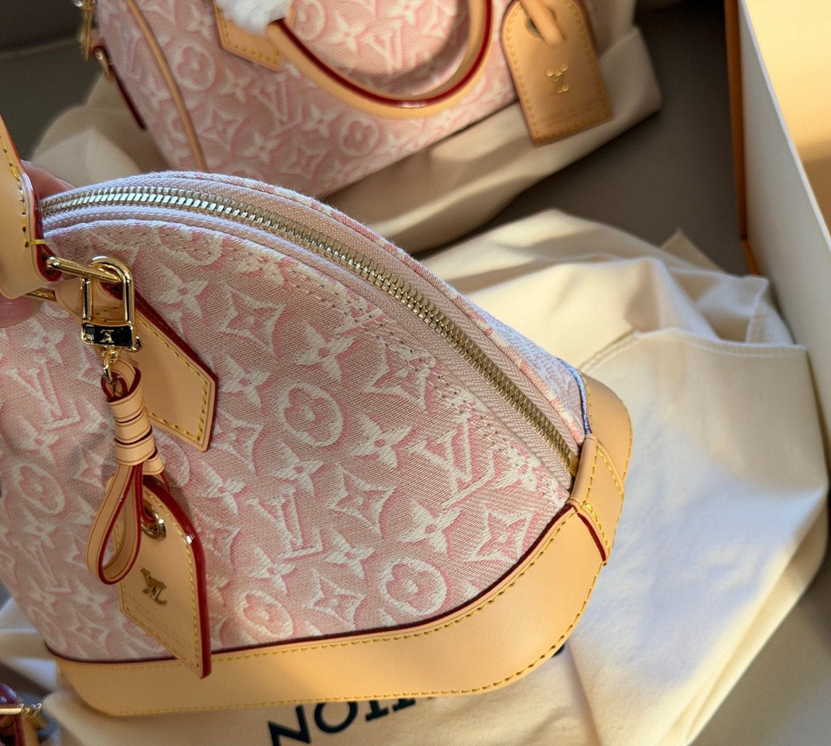 Louis Vuitton Alma BB Monogram Top-Handle Bag — side