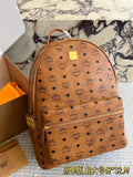 MCM Studded Monogram Backpack — hero
