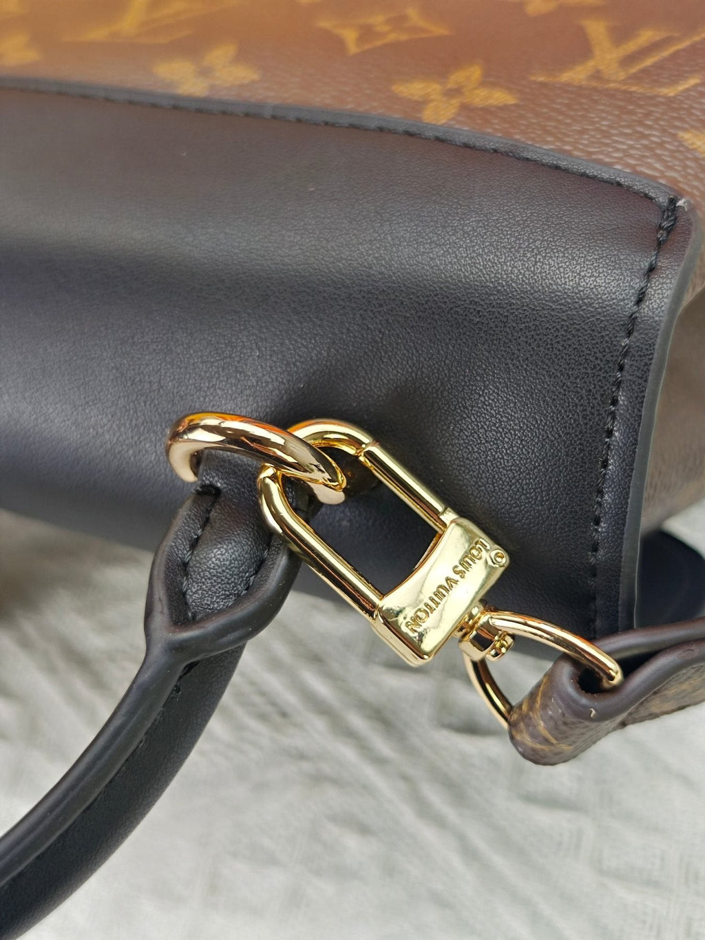 Louis Vuitton Madeleine BB Monogram Top-Handle Bag — detail
