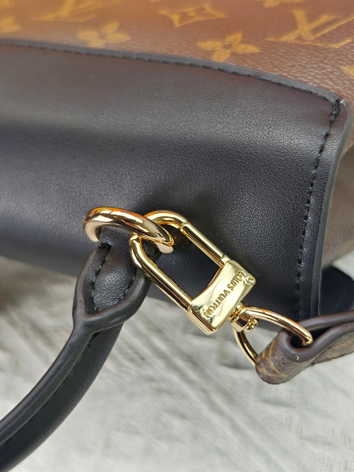 Louis Vuitton Madeleine BB Monogram Top-Handle Bag — detail