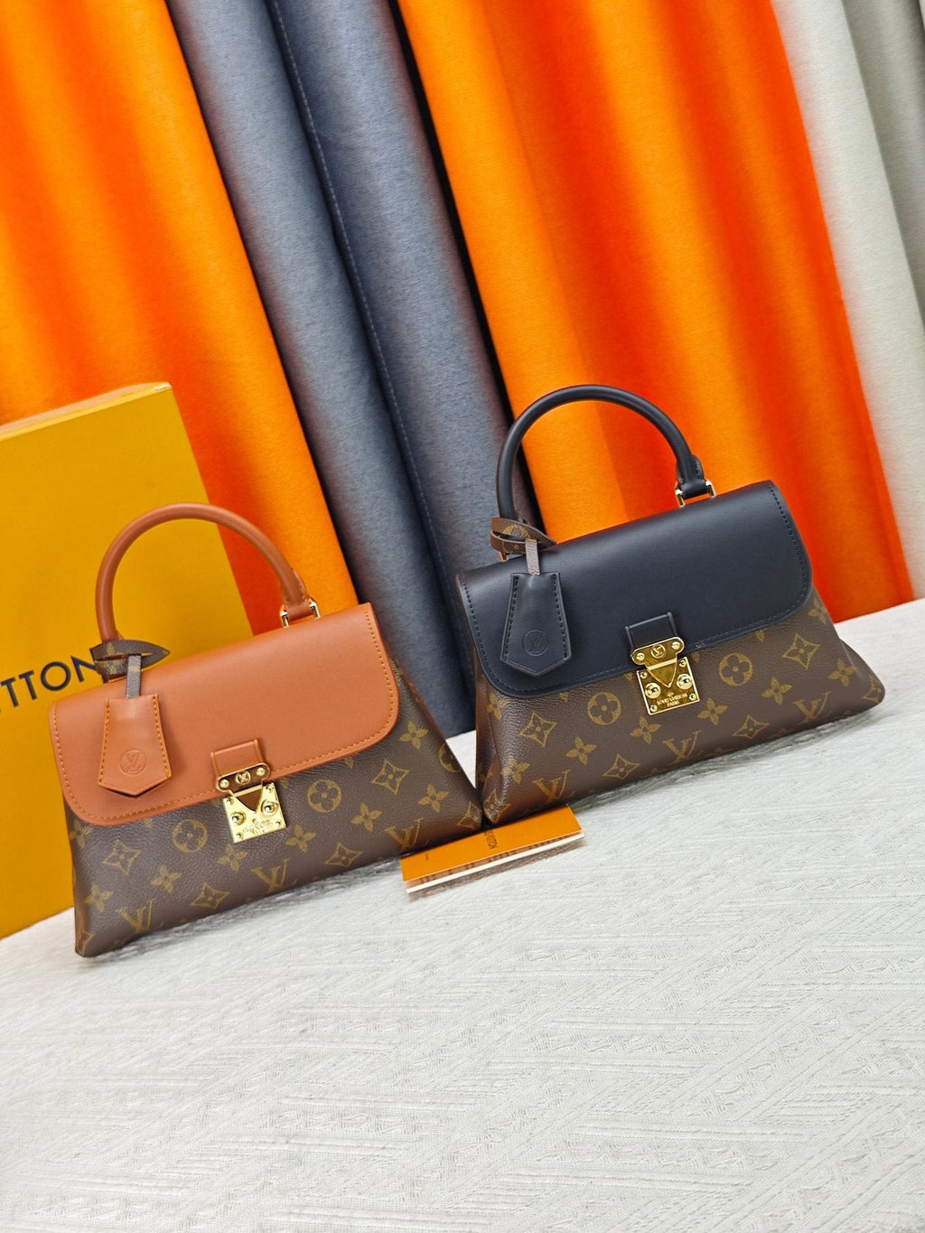 Louis Vuitton Madeleine BB Monogram Top-Handle Bag — comparison