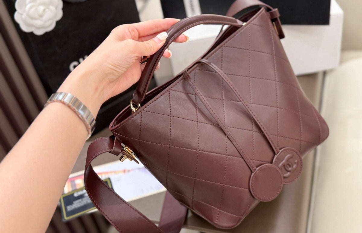 Chanel Diamond-Quilted Pendant Bucket Bag — detail