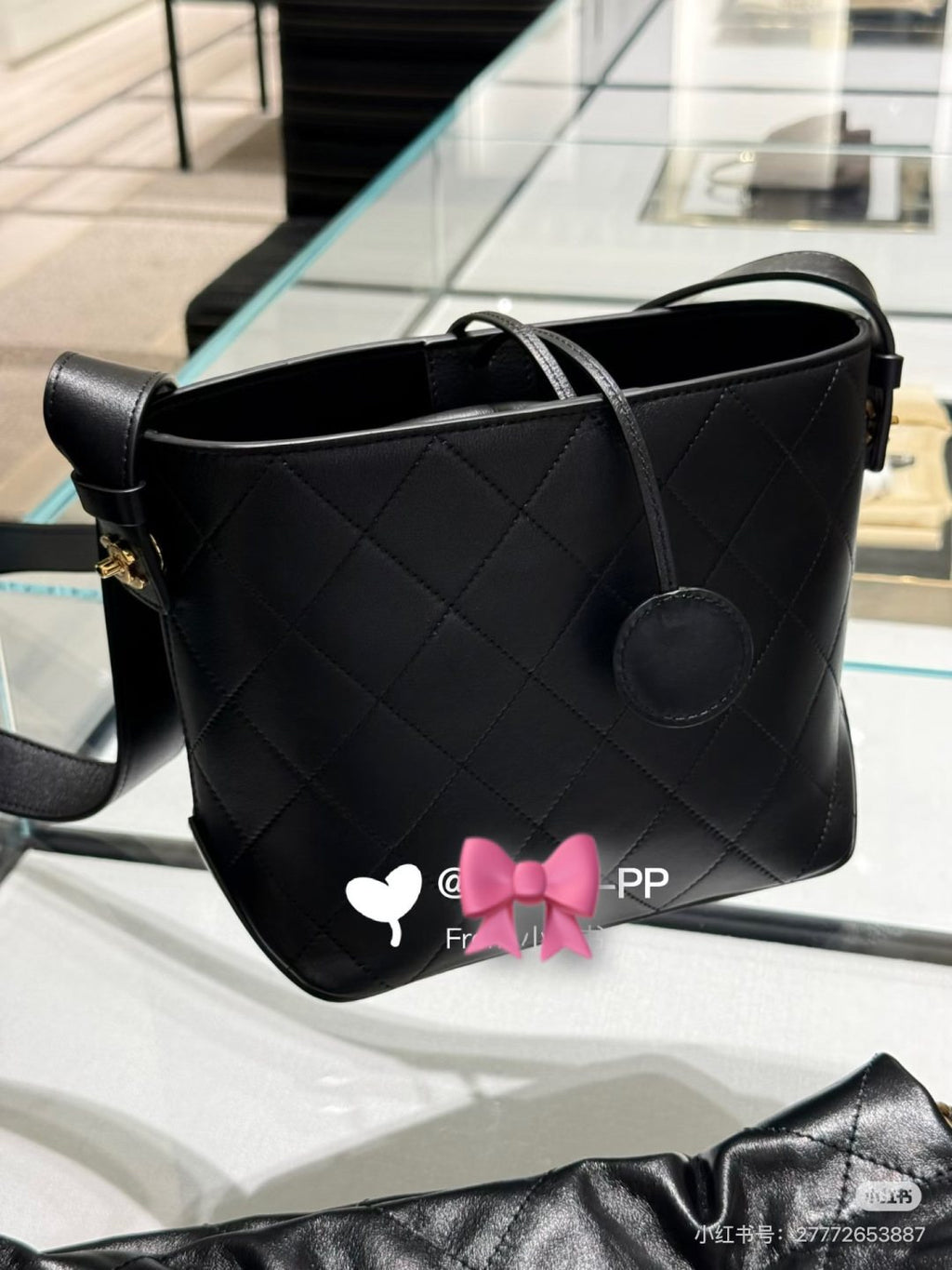 Chanel Diamond-Quilted Pendant Bucket Bag — hero