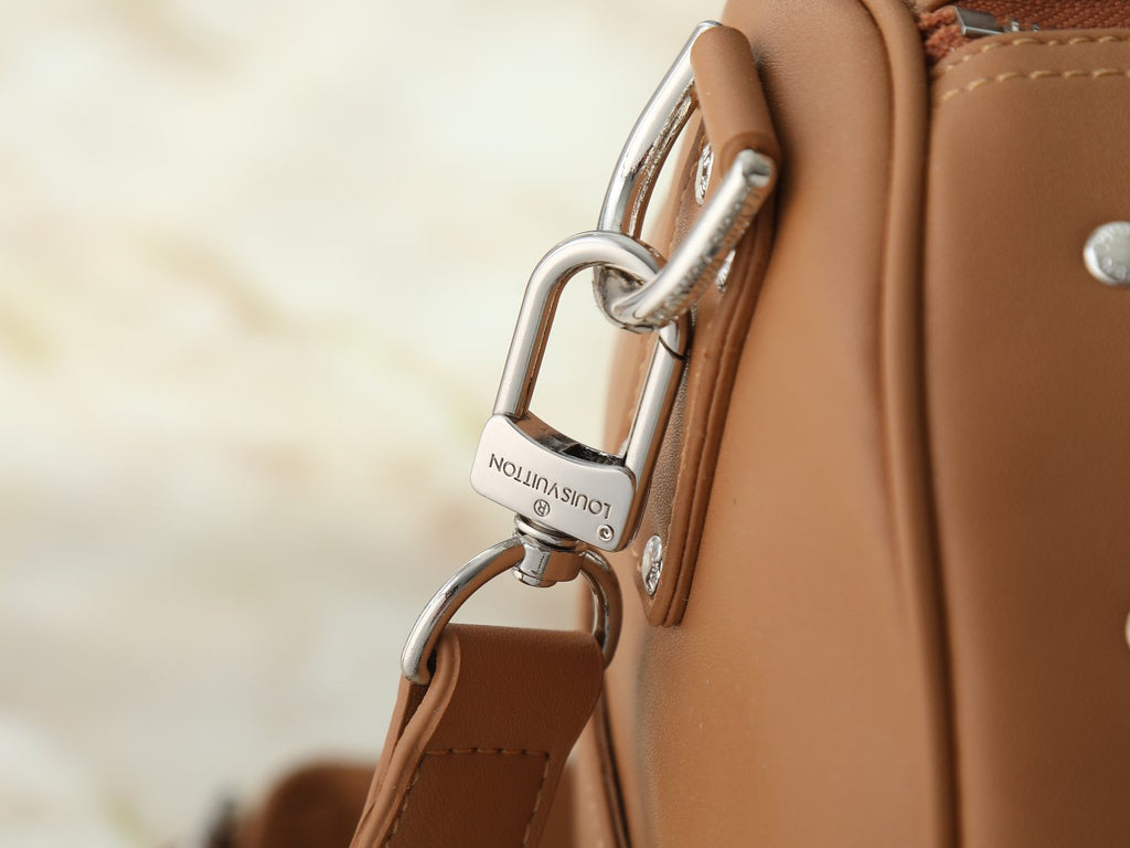 Louis Vuitton Keepall Studded Tan Duffel Bag — detail