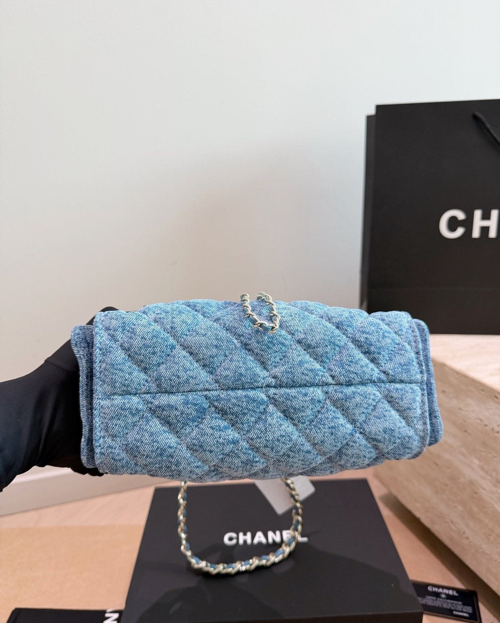 Chanel 25 Quilted Bucket Bag — detail