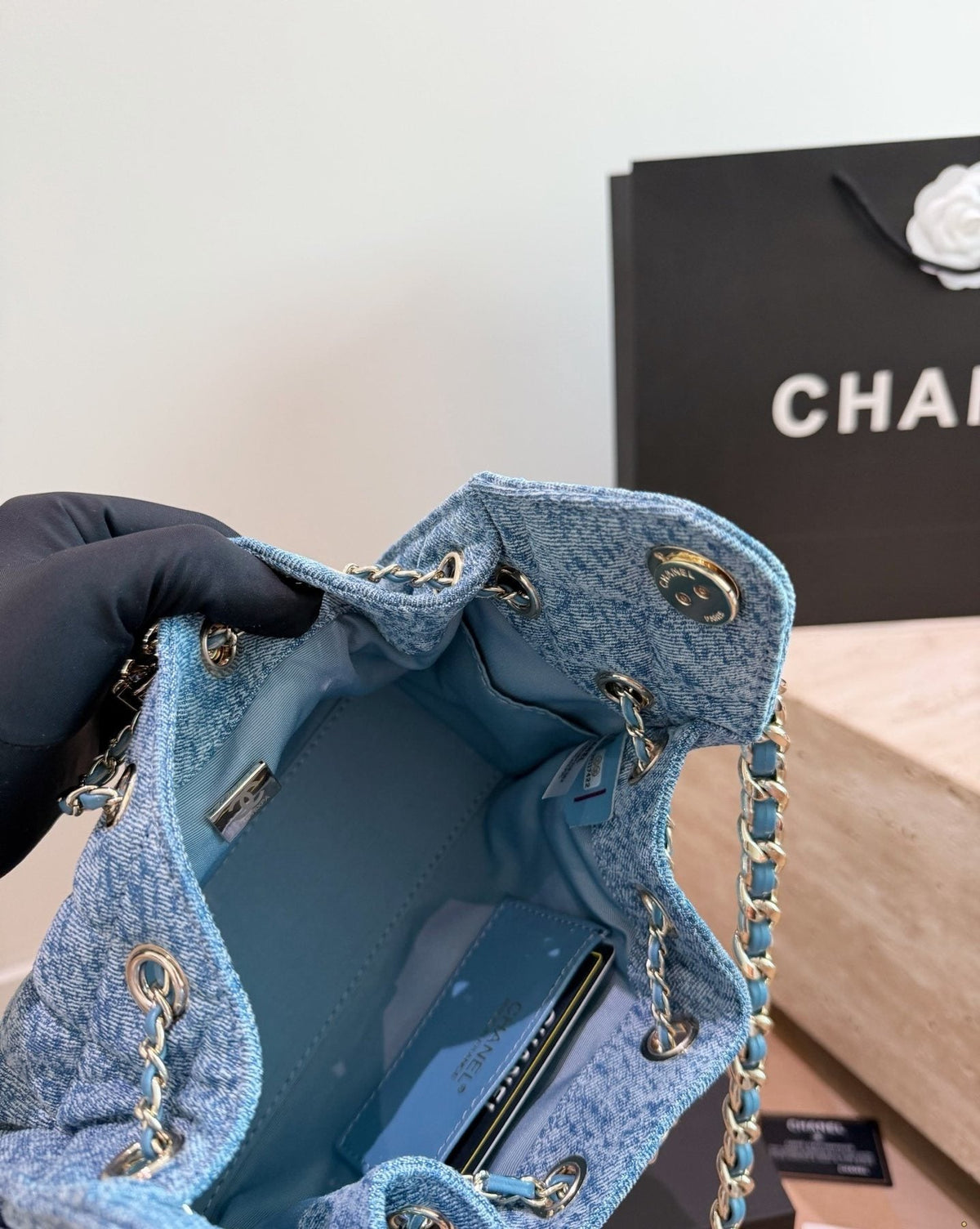 Chanel 25 Quilted Bucket Bag — detail