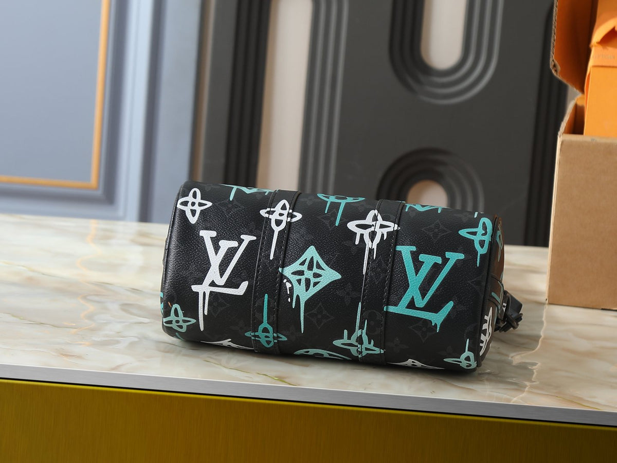 Louis Vuitton Keepall Bandoulière Duffel Bag — detail