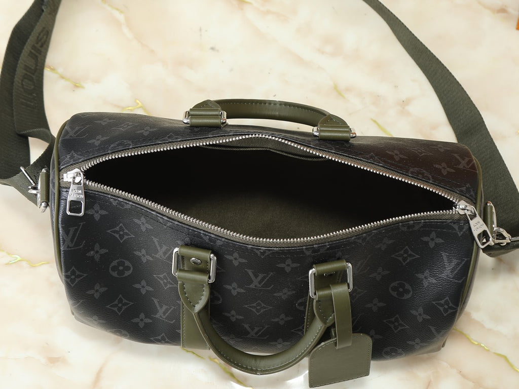 Louis Vuitton Keepall Bandoulière Duffel Bag — detail
