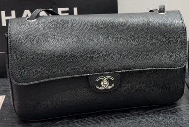Chanel Maxi Flap Pebbled Shoulder Bag — hero