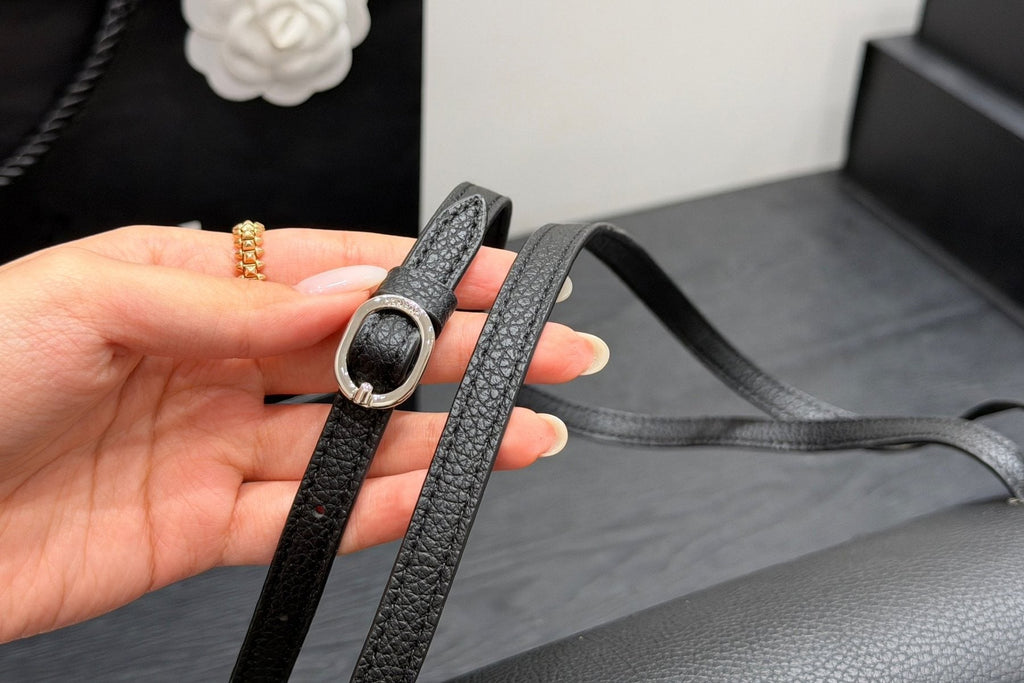 Chanel Maxi Flap Pebbled Shoulder Bag — detail