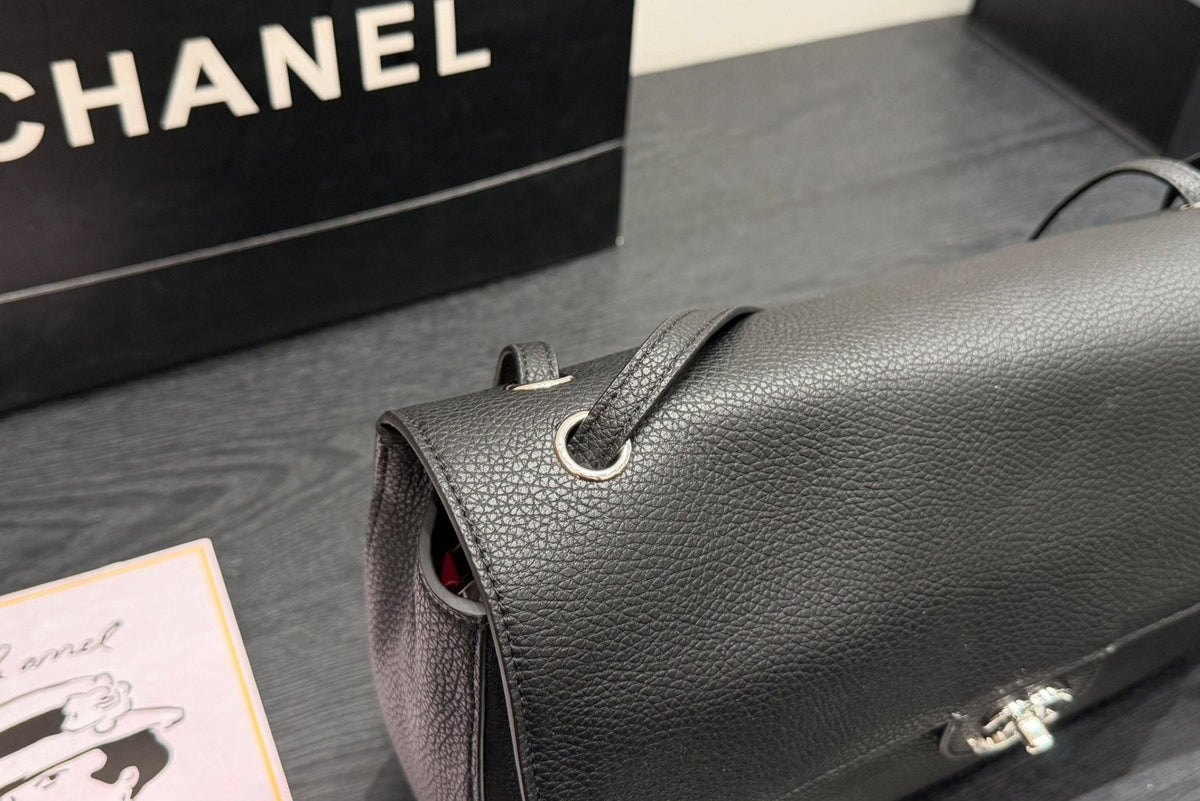 Chanel Maxi Flap Pebbled Shoulder Bag — detail