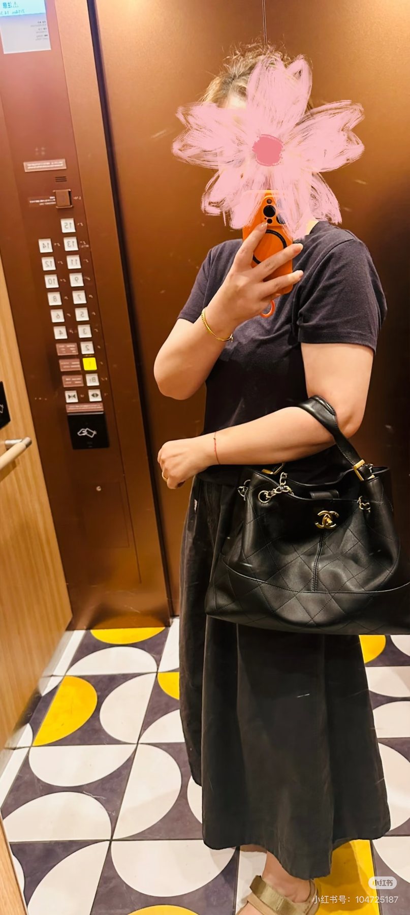 Chanel Quilted Hobo Bag with Draped Chain — model