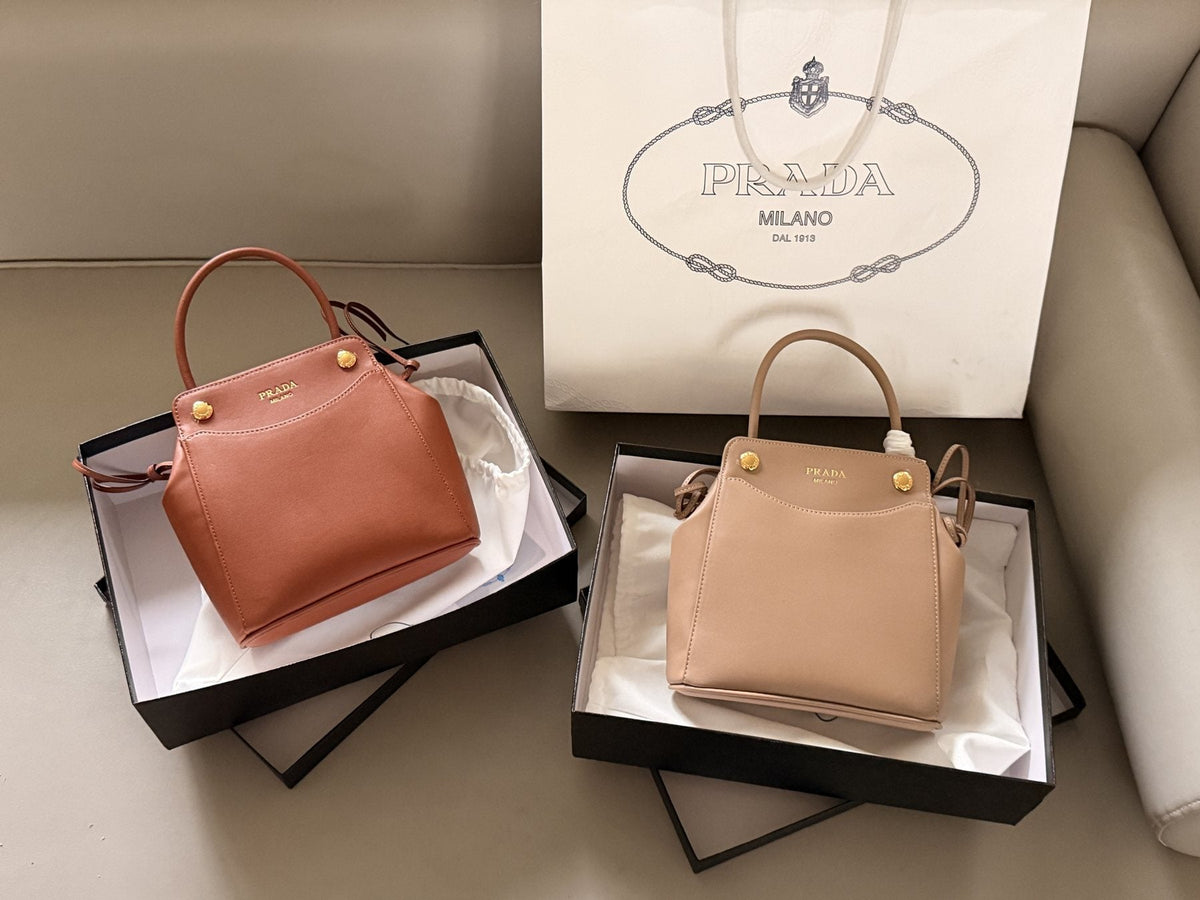 Prada Curved-Panel Top-Handle Bag — comparison