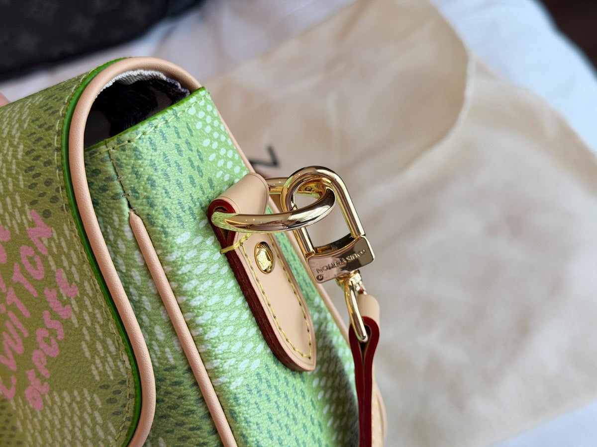Louis Vuitton Curved-Flap Messenger Bag — side
