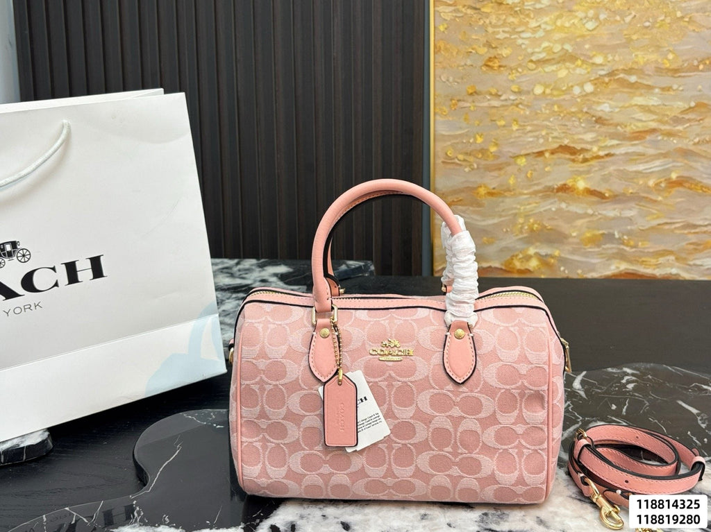Coach Rowan Pink Signature Barrel Bag — hero