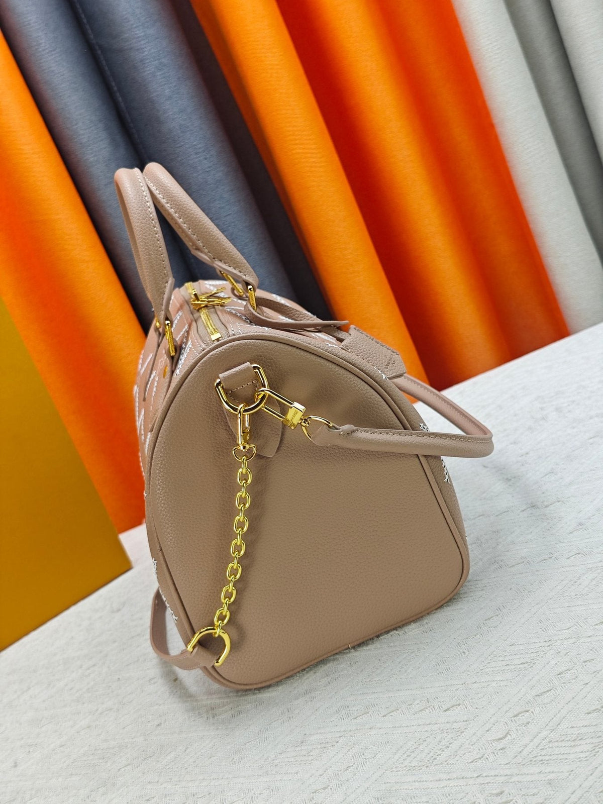 Louis Vuitton Speedy Bandoulière Printed Leather Bag — side