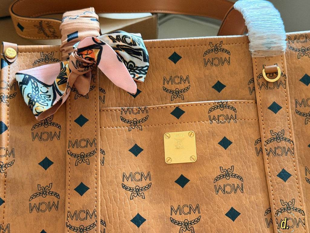 MCM Structured Monogram Tote with Front Plaque — detail