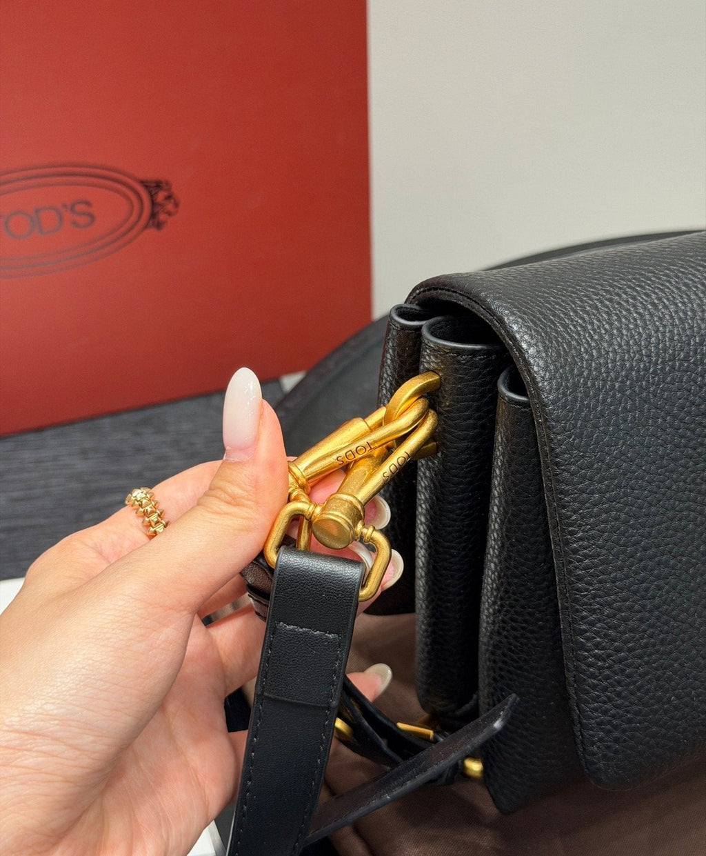 Tod's Black Accordion Flap Shoulder Bag — detail