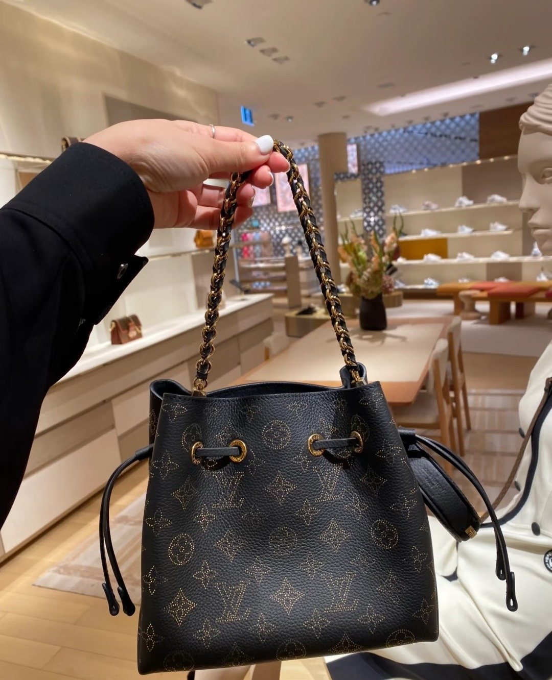 Louis Vuitton Bella Monogram Bucket Bag — model