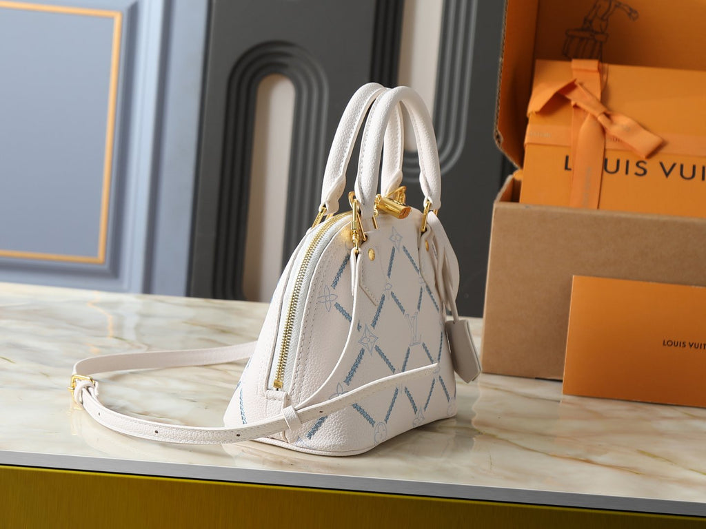 Louis Vuitton Alma BB Monogram Empreinte Couture Handbag — side