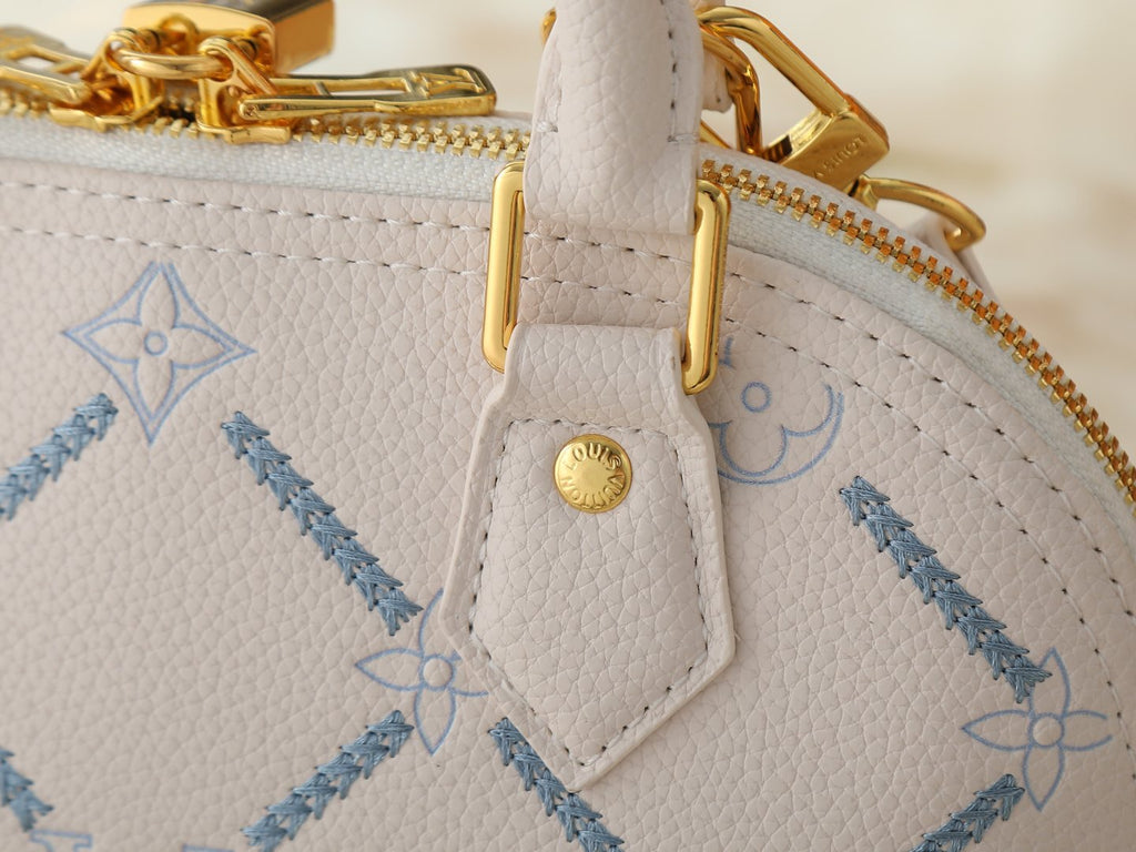 Louis Vuitton Alma BB Monogram Empreinte Couture Handbag — detail