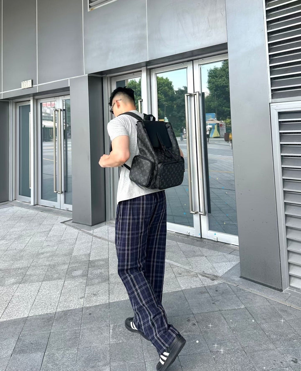 Louis Vuitton Apollo Monogram Eclipse Backpack — model